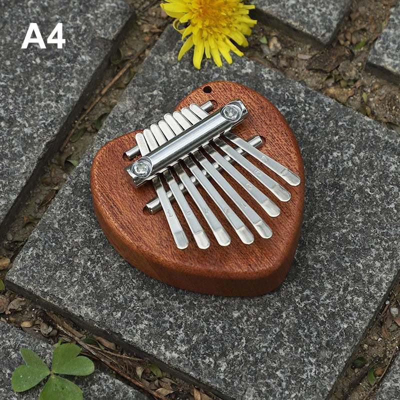 8 Key Kalimba Thumb Piano for Kids - Cute Music Instrument Pendant Keychain Accessory Beginner Friendly Gifts for Music Lovers