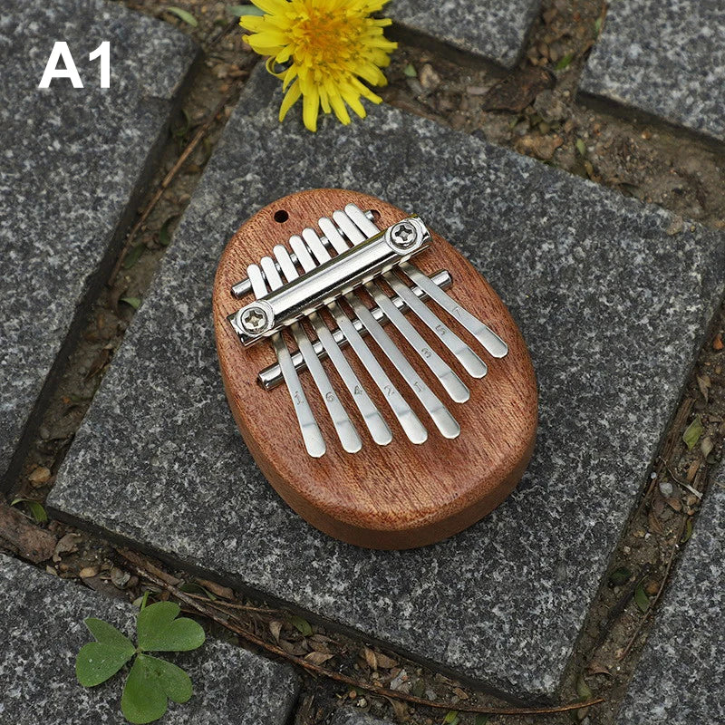 8 Key Kalimba Thumb Piano for Kids - Cute Music Instrument Pendant Keychain Accessory Beginner Friendly Gifts for Music Lovers